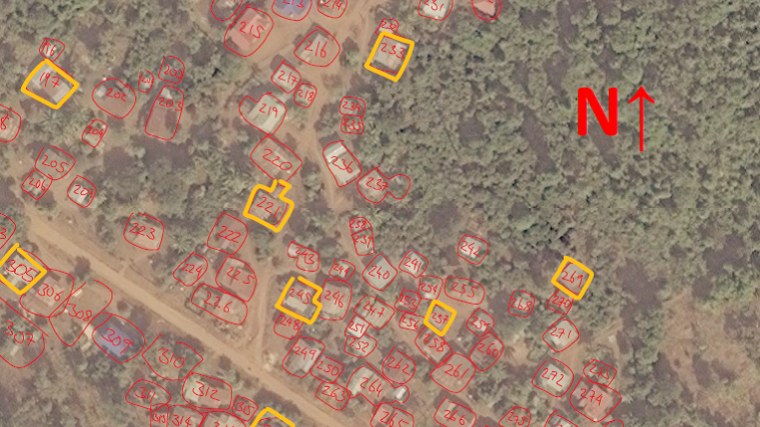 Satellite image of a rural village with the houses numbered