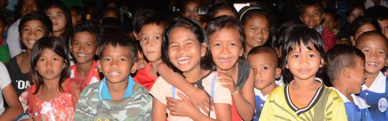 Schoolchildren in the audience of a Village Drama